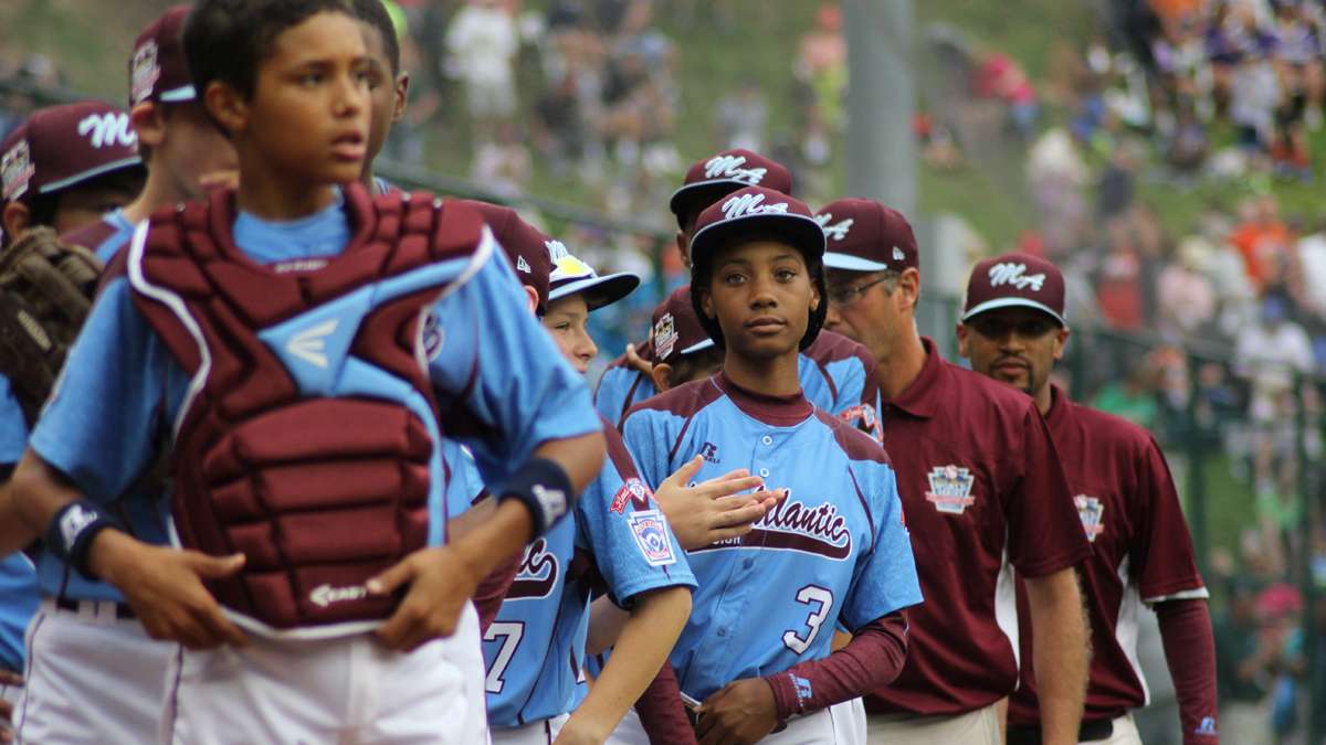  The Taney Dragons celebrate a 4-0 win at the Little League World Series in Williamsport, Pa., August 2014. (Kimberly Paynter/WHYY) 