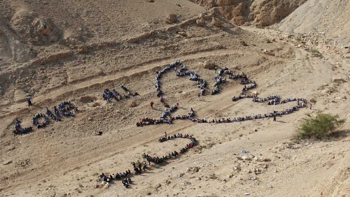  Hundreds of Palestinian children joined a United Nations Relief and Works Agency activity to send out a message of peace by lining up in the shape of a dove and the words 