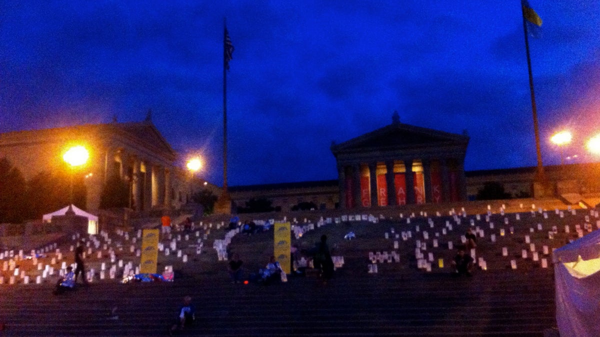  A walk to prevent suicide ends with a candlelight ceremony on the Art Museum steps. (Maiken Scott/WHYY) 