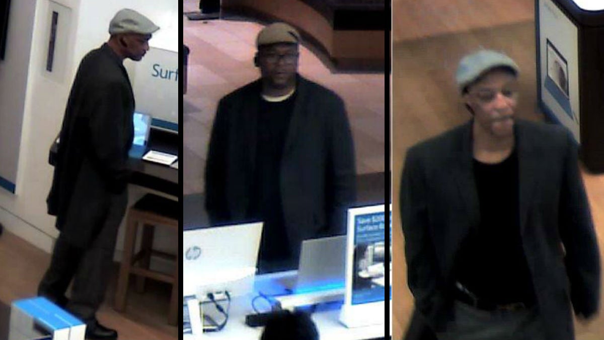 Surveillance photos show two men Delaware State Police say stole laptops from the Microsoft store in the Christiana Mall. (photo courtesy Delaware State Police)