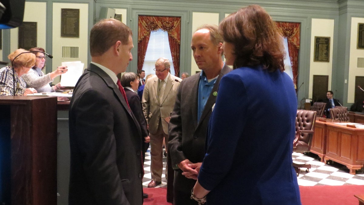  Lt. Gov. Matt Denn meets with Mark Barden and Nicole Hockley, the parents of two Sandy Hook victims.(Shana O'Malley/WHYY)  
