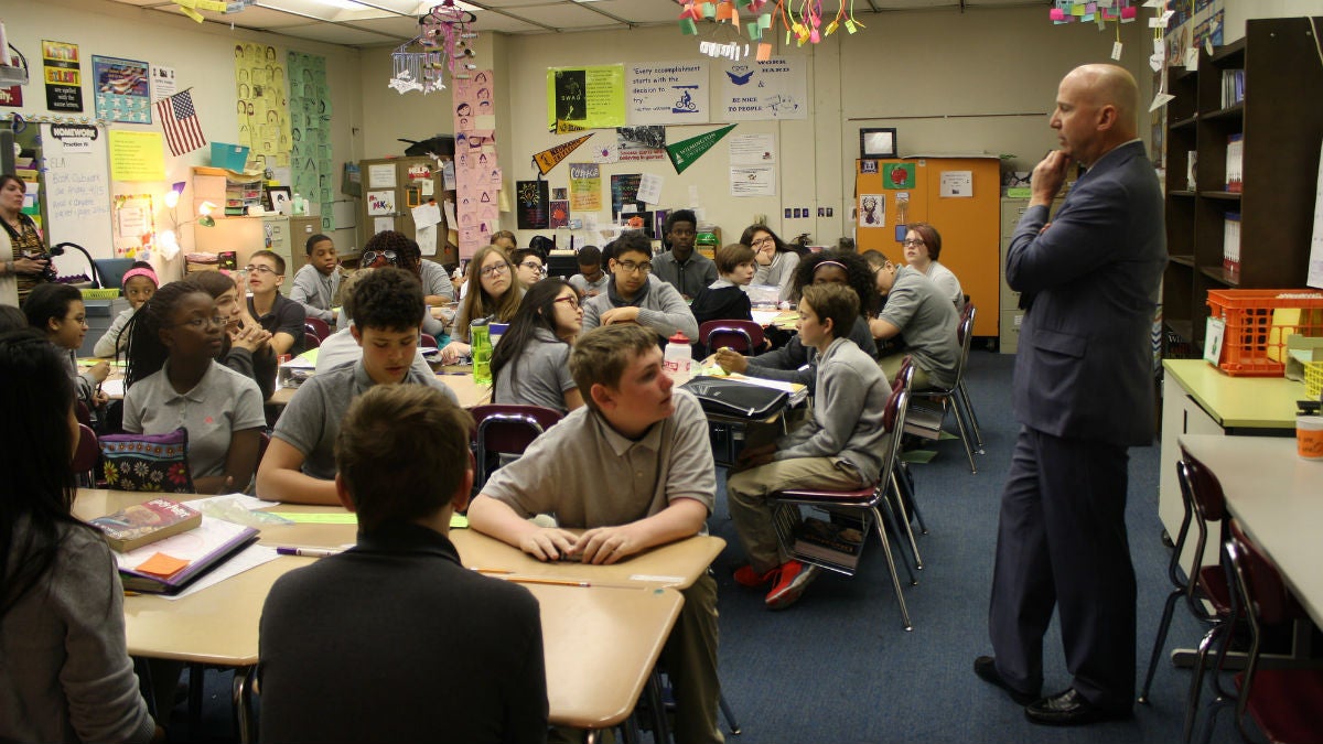 Delaware Gov. Jack Markell talks with students at Gauger-Cobbs Middle School. (photo courtesy Markell admin./Flickr)