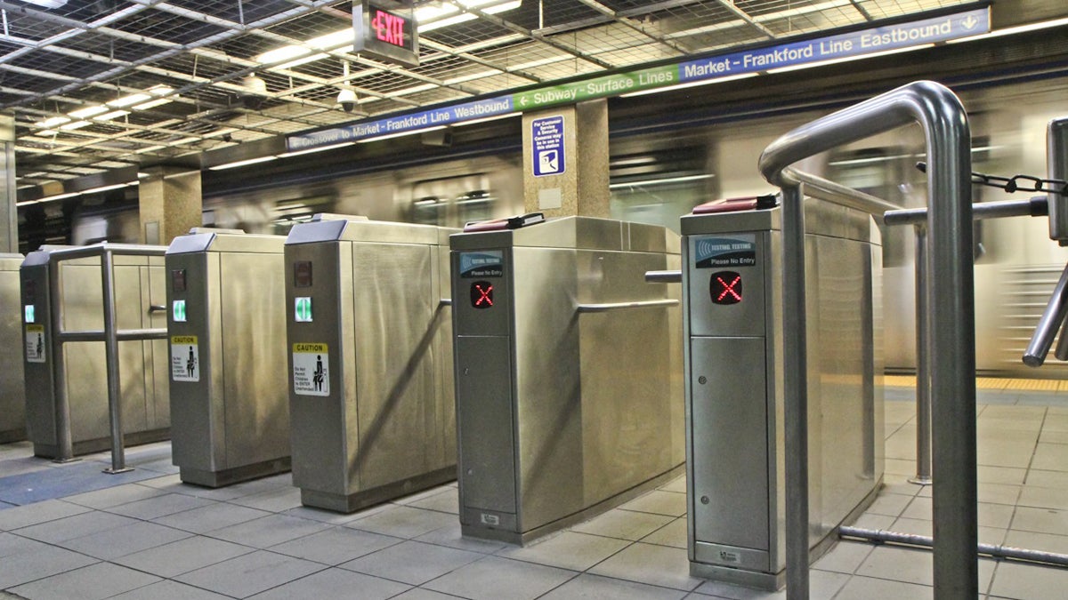  Two SEPTA Smartcard testing stations are installed at the Market-Frankford Line 13th Street stop. Electronic payment would be another step toward the system Philly deserves, says Michael Froehlich. (Kimberly Paynter/WHYY, file) 