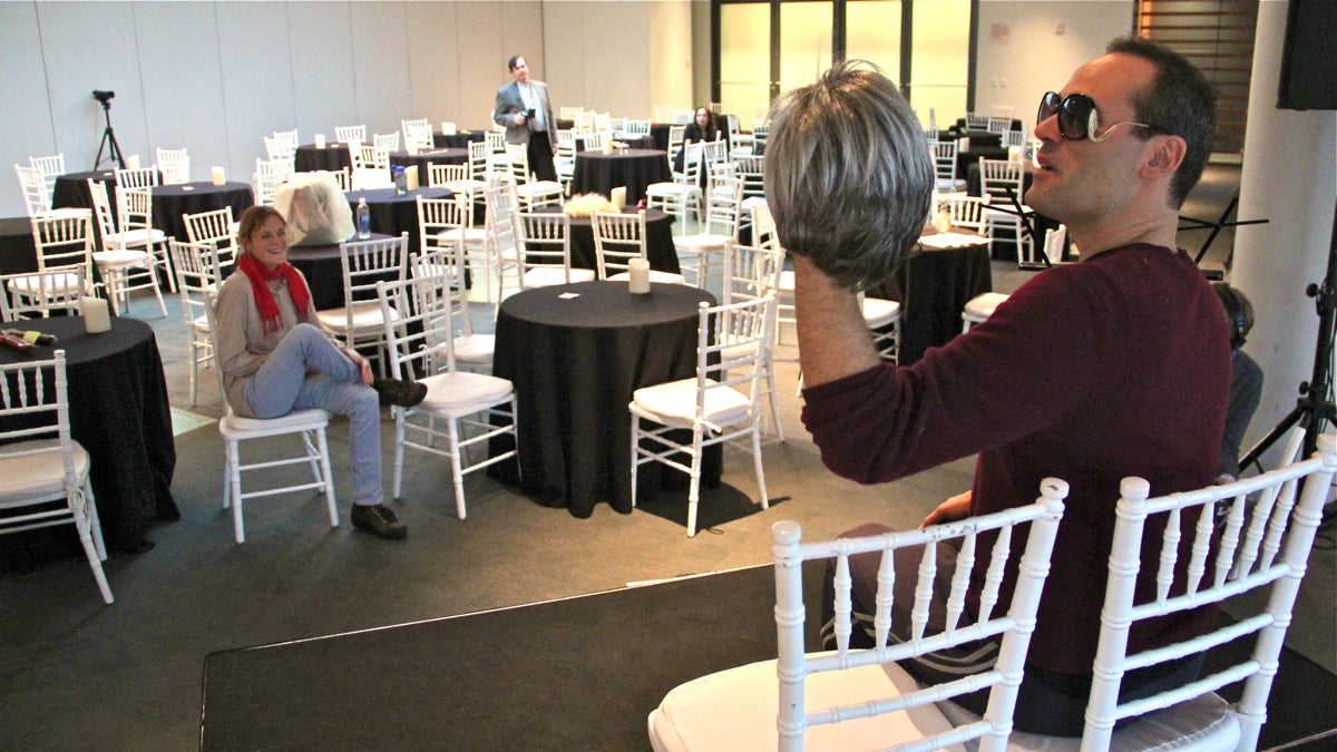  Dito van Reigersberg, also known as Martha Graham Cracker, works through his act with director Elizabeth Stevens at the National Museum of Jewish History. (Emma Lee/WHYY) 