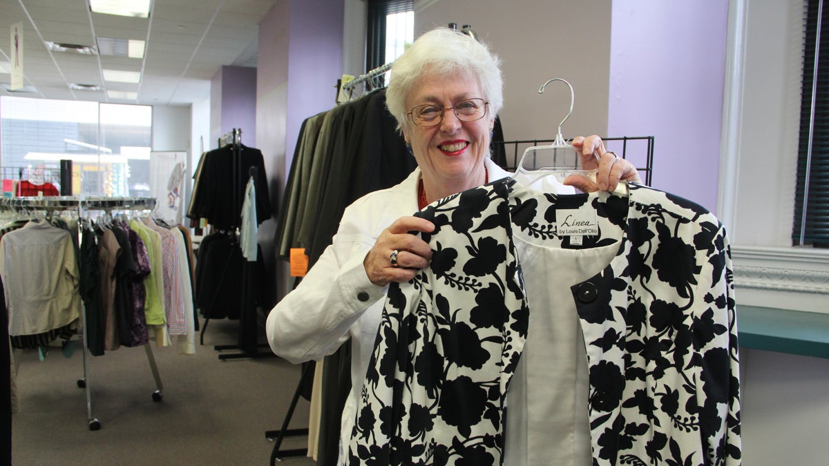 Mary Campbell volunteers at Career Wardrobe in Center City, where she volunteers to help low income individuals get the professional attire they need to secure and maintain employment opportunities and career advancement.  (Emma Lee/WHYY)