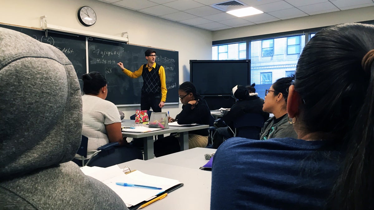 Gregory Fein teaches a CUNY Start math class at Borough of Manhattan Community College. (Karen Shakerdge/for WHYY)