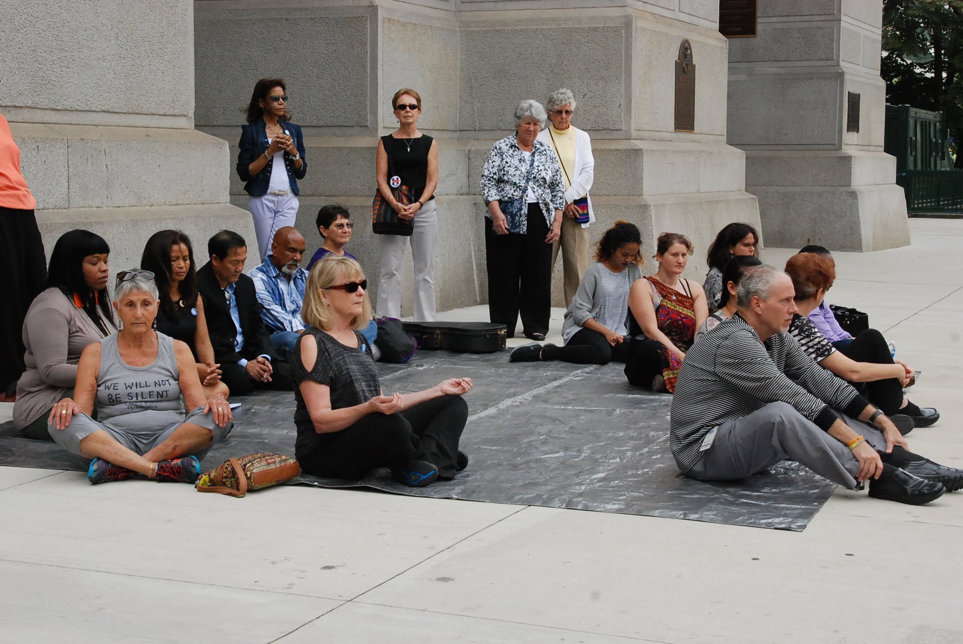 A meditation flash mob in Philly gathers to mark  Peace Day. (Tom MacDonald/WHYY)