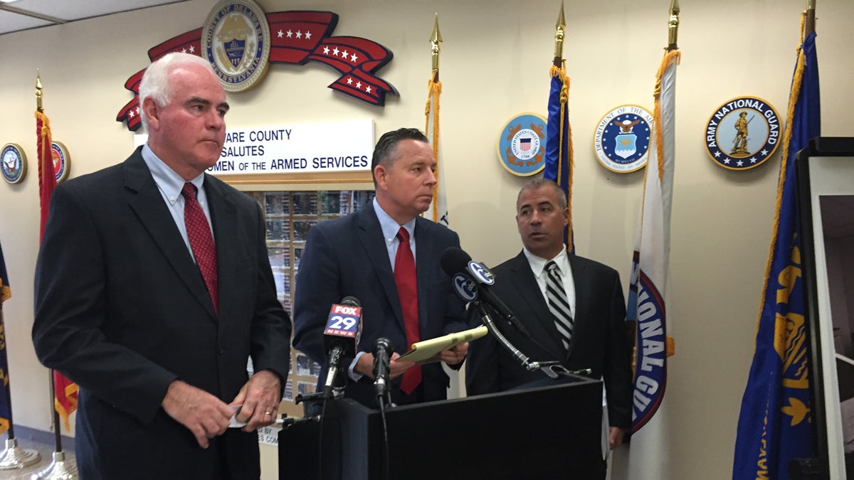 U.S. Rep. Pat Meehan (left) stands with Delaware County Republican Party Chairman Andrew Reilly (center). (Aaron Moselle/WHYY)