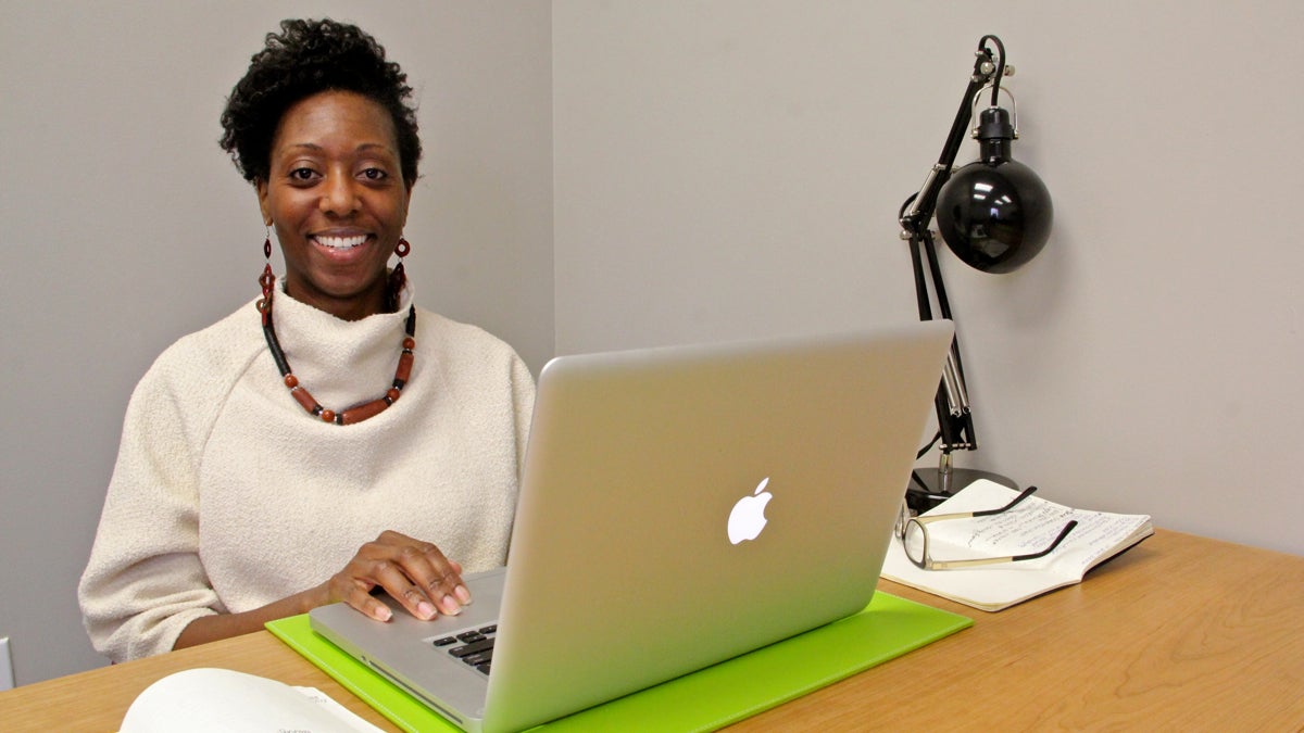  Consultant Melissa Howell makes use of a workspace at the Immigration Innovation Hub at Mt. Airy USA. (Emma Lee/WHYY) 