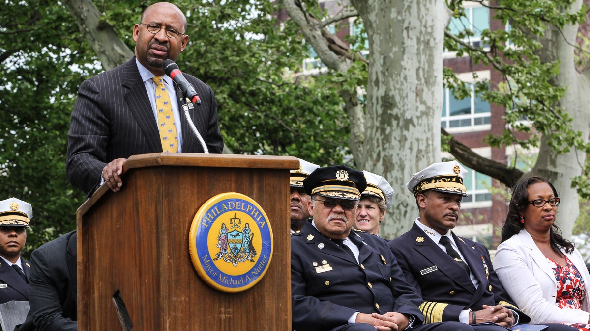 At a Wednesday afternoon memorial event, Mayor Michael Nutter slammed mayoral candidates who said they wouldn't retain Police Commissioner Charles Ramsey. (Kimberly Paynter/WHYY) 