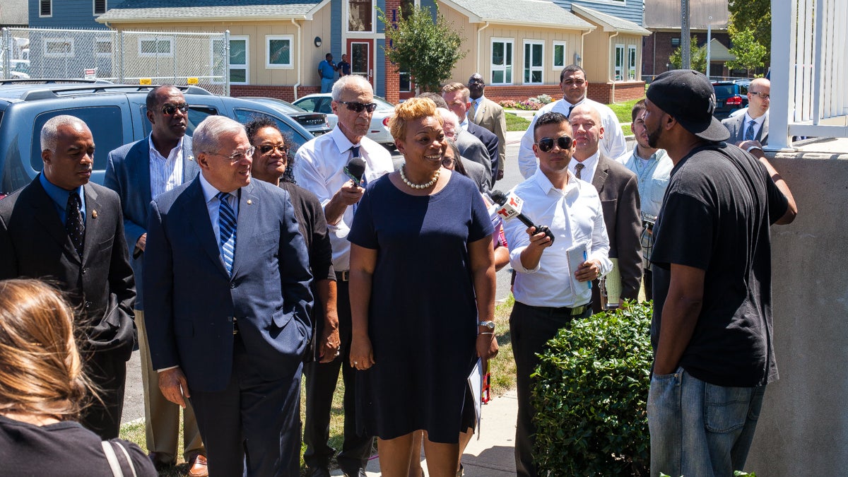 U.S. Senator Bob Menendez and Camden Mayor Dana Redd tour the Mount Ephraim neighborhood. (Brad Larrison/for NewsWorks) Ephraim neighborhood. (Brad Larrison/for NewsWorks)