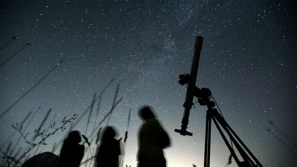  The annual Perseid meteor shower is promising to put on a dazzling sky show. Astronomers say up to 100 meteors per hour are expected to streak across the sky during the shower's peak. (Petar Petrov/AP Photo, file) 