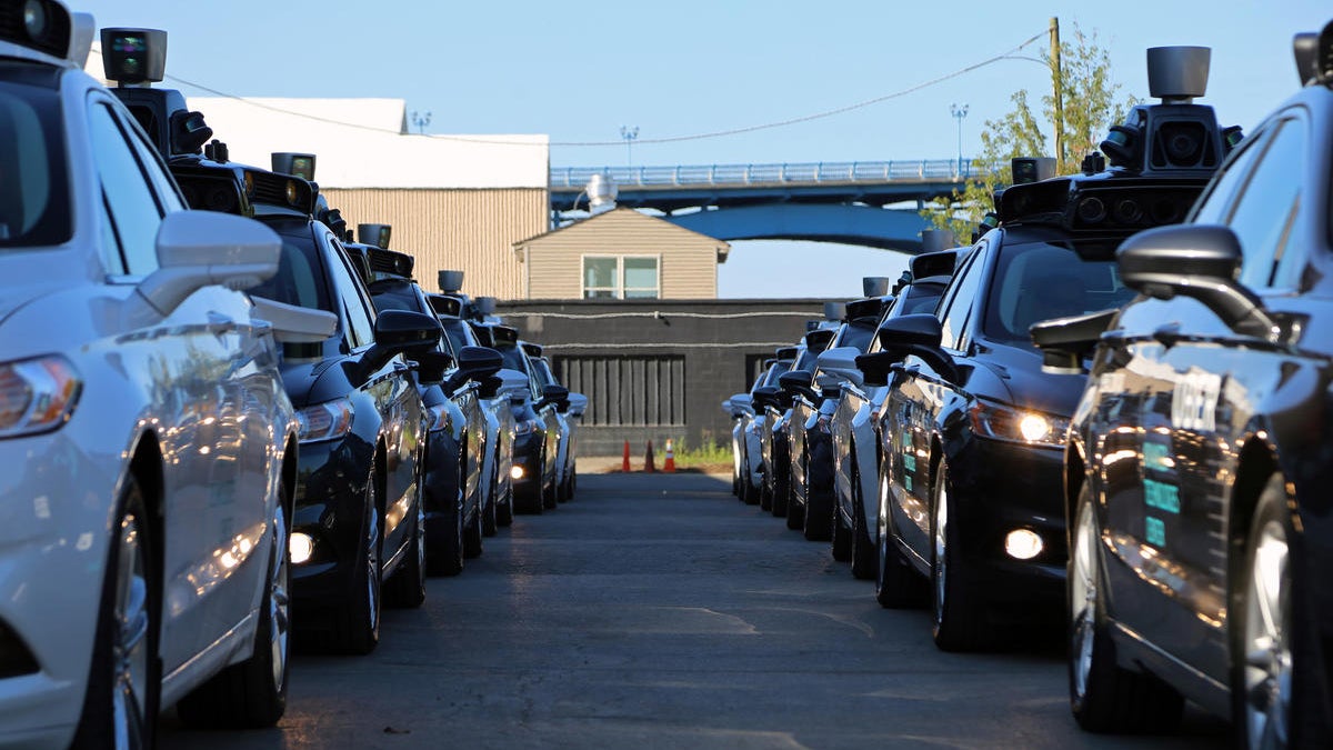 Uber’s self-driving cars wait at the company’s Advanced Technologies Center in Pittsburgh on Sept. 13
