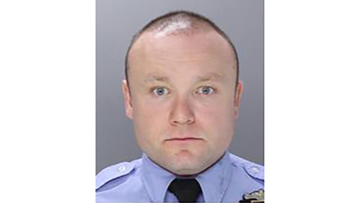 Officer Michael Winkler was arrested and suspended for allegedly stealing money from workers in Bristol Township. (photo courtesy of Philadelphia Police Department)