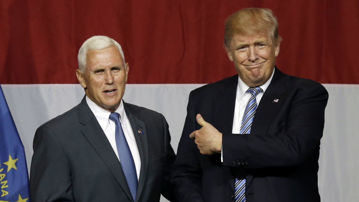 Indiana Gov. Mike Pence is shown with Republican presidential candidate Donald Trump at a rally in Westfield