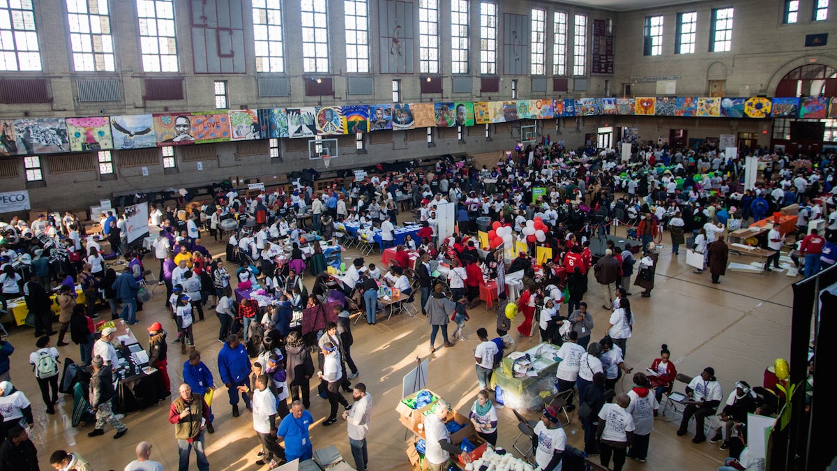 Philadelphians walk through a job and services fair at Girard College on Martin Luther King Day 2017. (Brad Larrison for NewsWorks)