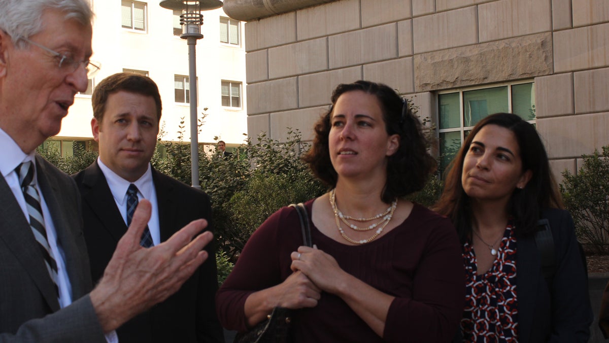  Sasha Ballen and Dee Spagnuolo (far right), the first couple to receive a marriage certificate issued to a same-sex couple in Pa., are now party to two of five lawsuits filed since the U.S. Supreme Court struck down a section of DOMA back in June. Attorney, Robert C. Heim (left) is helping to represent them. (Emma Jacobs/for NewsWorks) 