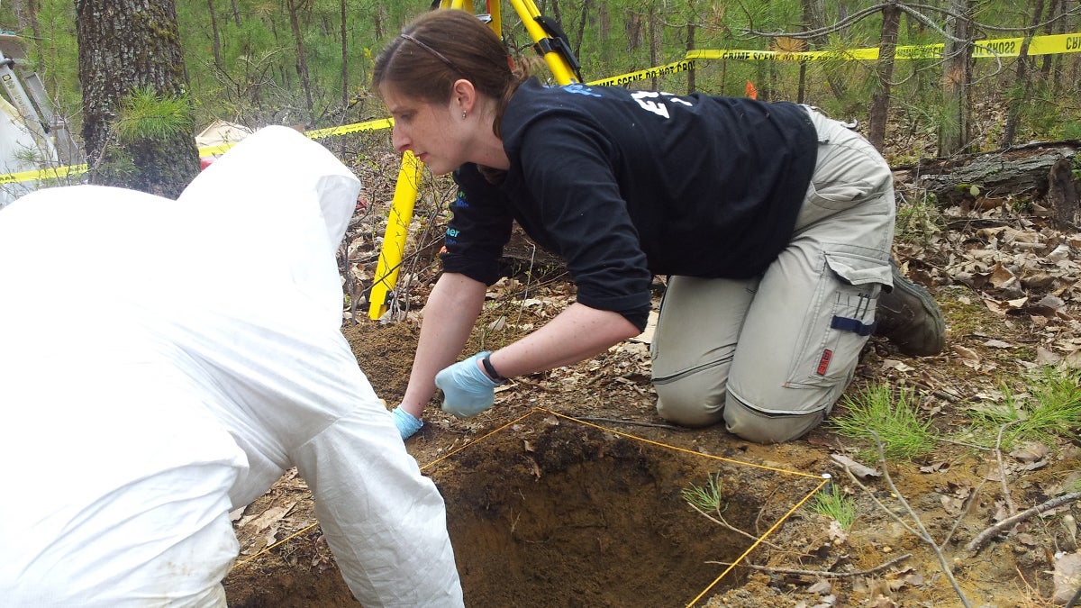  Kimberlee Sue Moran of the Center for Forensic Science Research & Education works at a dig site during a police training course. (Image courtesy of Moran)   