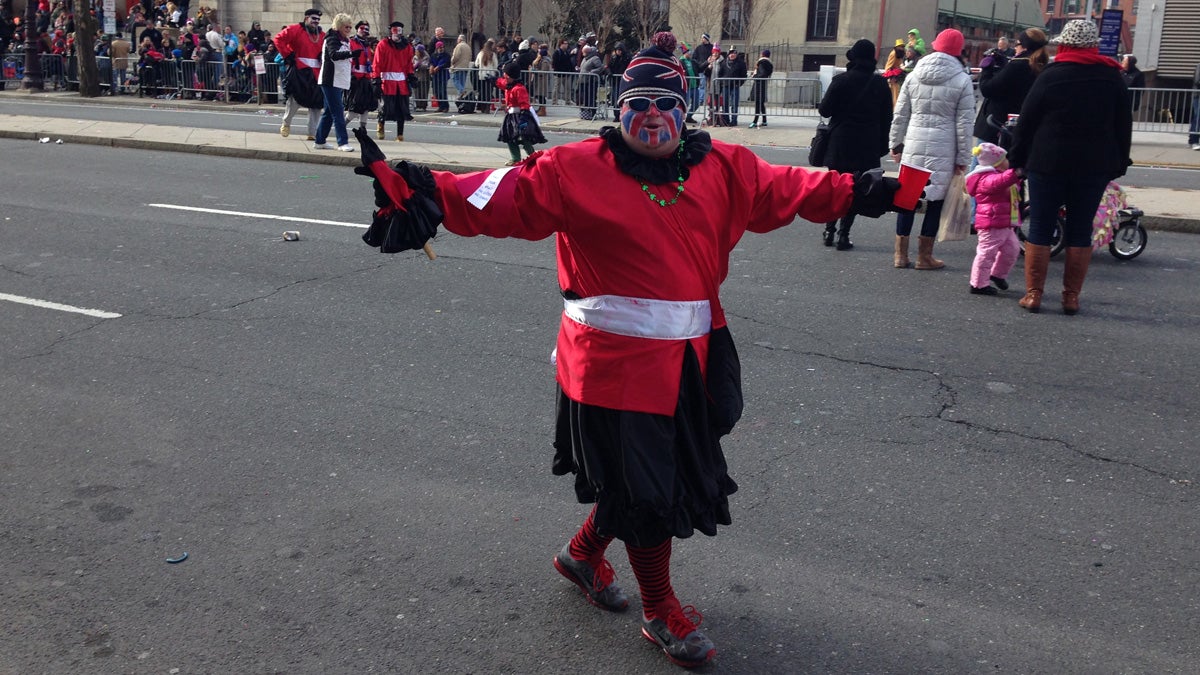  A mummer sports a British-themed costume at the parade. (Holly Otterbein/WHYY) 