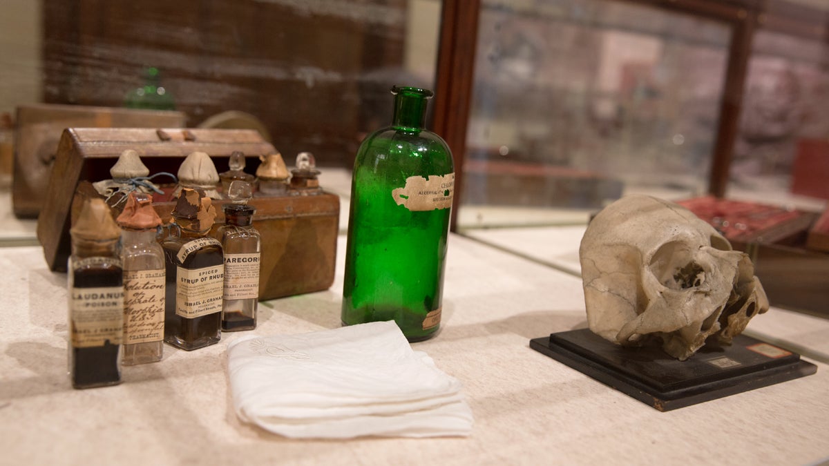  The partial skull of a soldier who was shot through his eyes causing total blindness with chloroform bottles and other soothing medicines at the Mütter Museum. (Lindsay Lazarski/WHYY)  