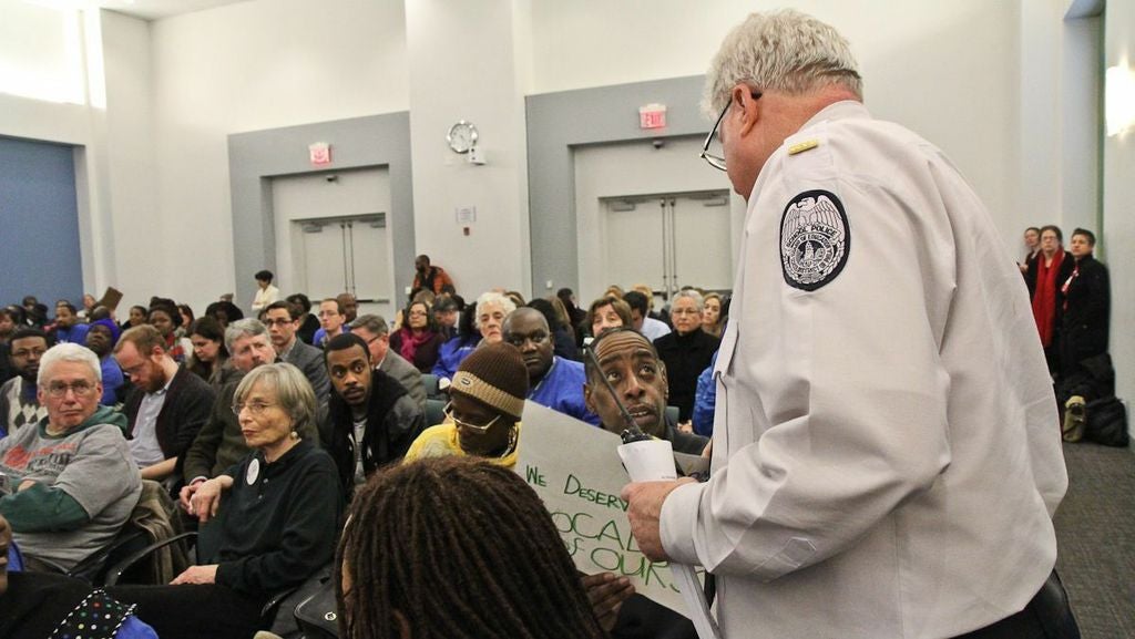  Parents, teachers and charter school applicants crowd the room last week as Philadelphia's School Reform Commission voted on 30 proposals for new schools. (Kimberly Paynter/WHYY) 