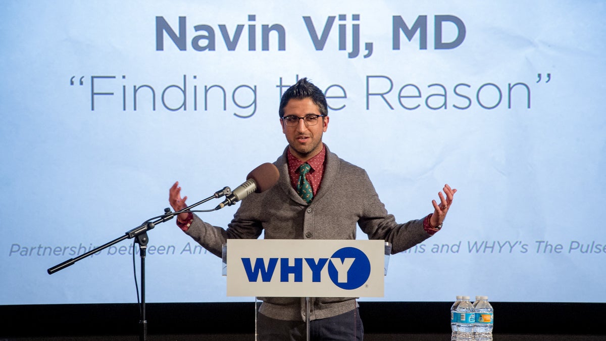 Navin Vij speaking at the Stories From The Heart story slam. (Dan Burke/for WHYY)