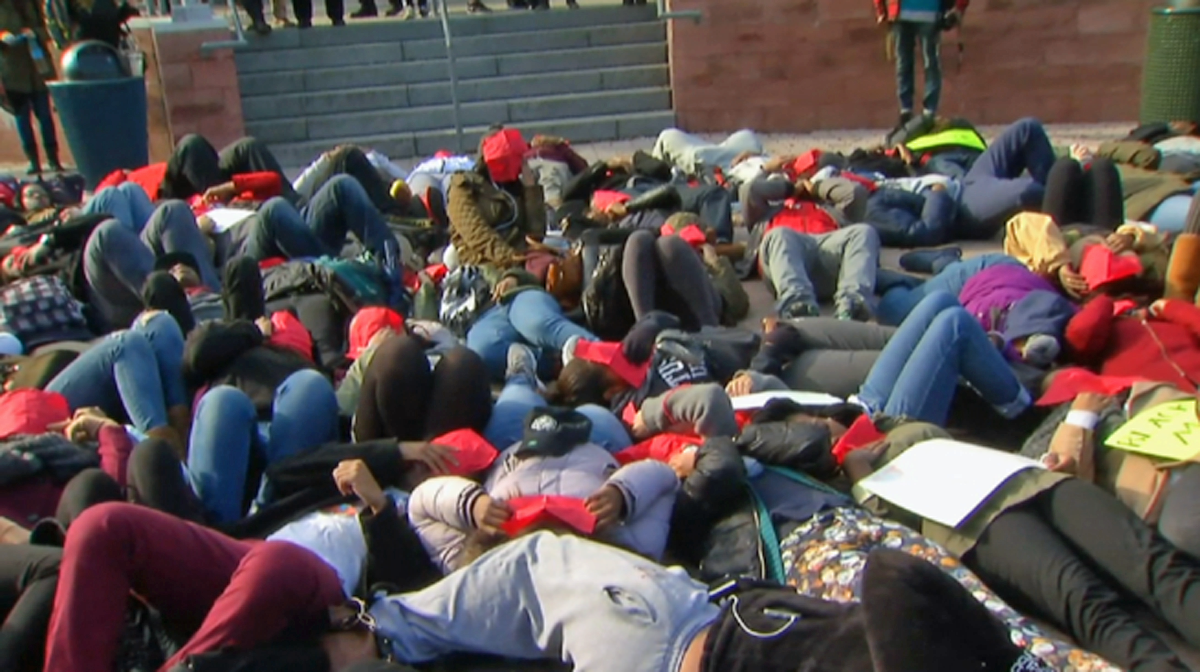  Temple University students lay down in protest Thursday afternoon as a demonstration against racism (Image courtesy of NBC10) 