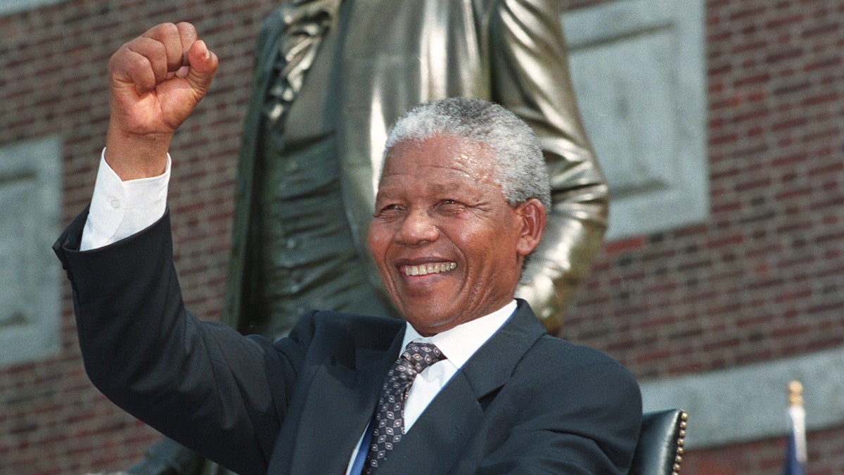  Nelson Mandela is shown seated in front of Independence Hall on July 4, 1993, in Philadelphia, where he was later presented with the Liberty Medal by President Bill Clinton. (AP Photo/J. Scott Applewhite) 