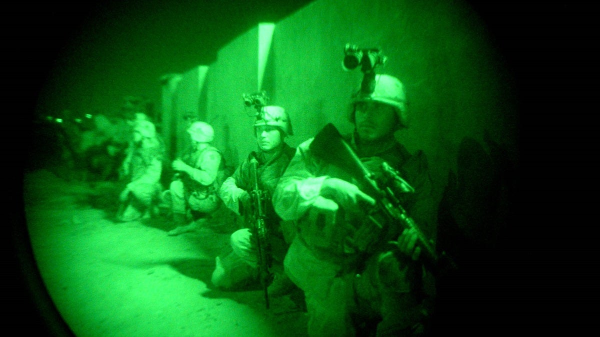  US soldiers are seen  through a night vision scope in Iraq. (AP Photo/Rob Griffith) 