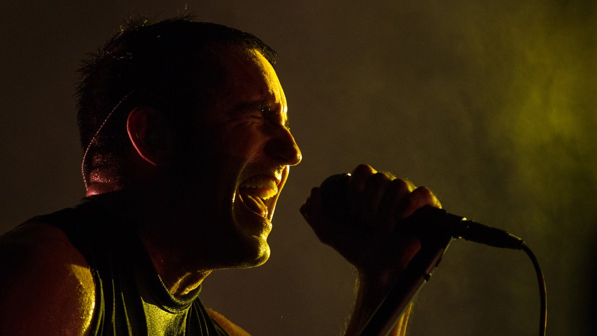  Trent Reznor, lead singer of the band Nine Inch Nails performs at the Lollapalooza Festival in Chicago, Friday, Aug. 2, 2013. The more than two-decade-old festival opens Friday in Chicago's lakefront Grant Park. (AP Photo/Scott Eisen) 