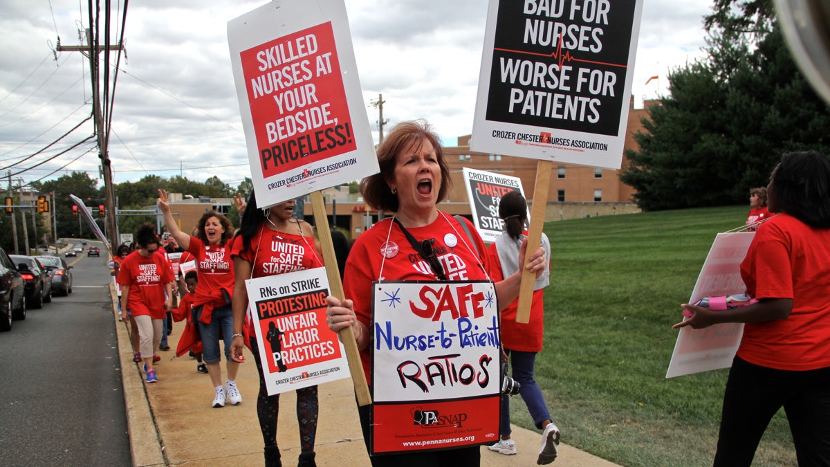  Kathy Toomey, an endoscopy nurse at Crozer for 34 years, takes to the picket line with other nurses. She says staffing levels at the hospital make it 