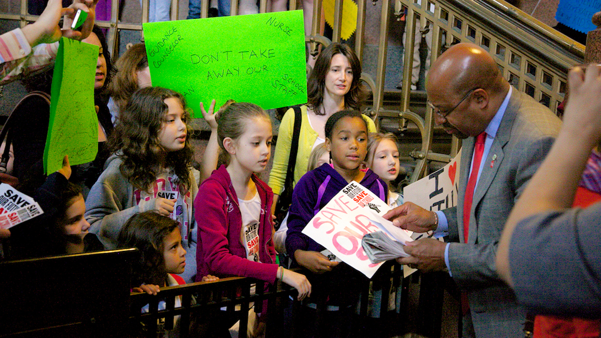 Philadelphia Mayor Michael Nutter receives letters from students pleading to save their schools. (Nathaniel Hamilton/for NewsWorks, file) 