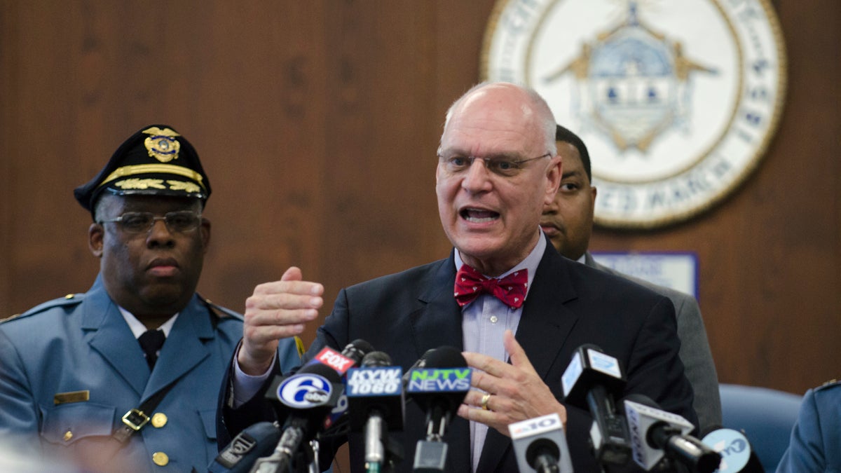 Atlantic City Police Chief Henry White looks on as Atlantic City Mayor Don Guardian talks about the city shutdown during a press conference held at Atlantic City