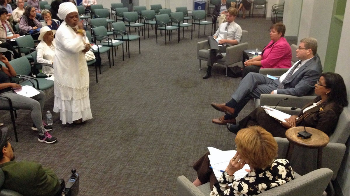  Community activist Mama Gail addresses the SRC during an informal meeting at The School District of Philadelphia's headquarters on June 1, 2015. Also pictured, WHYY education reporter Kevin McCorry (seated, top right) (Bill Hangley/WHYY) 