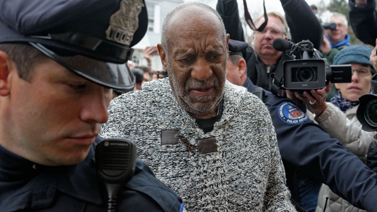  Bill Cosby wends through a crowd to District Court in Elkins Park, Pennsylvania, where he was required to post bail and surrender his passport after being charged with sexual assault. (Bastiaan Slabbers/for NewsWorks) 