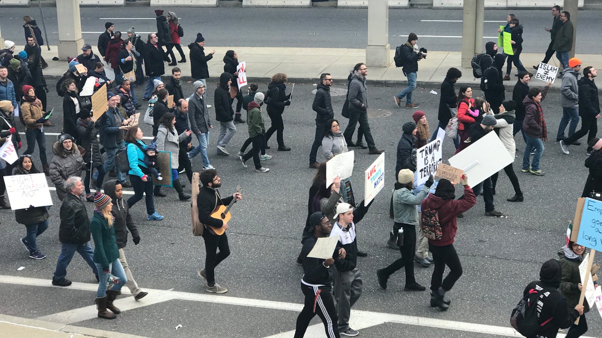 Protesters march around the Philadelphia International Airport on the second day of action against President Trump's executive order banning and detaining refugees (Bastiaan Slabbers for NewsWorks)