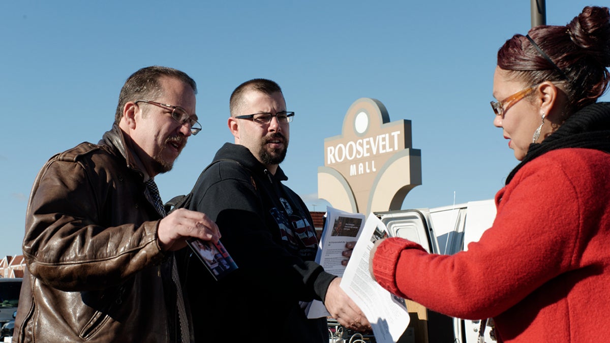  Ross Feinberg (left) Republican running for Register of Wills; and Chris Sawyer (center) the Republican candidate running for Philadelphia sheriff canvas together at the flea market outside Roosevelt Mall in Northeast Philadelphia (Bastiaan Slabbers/for NewsWorks) 