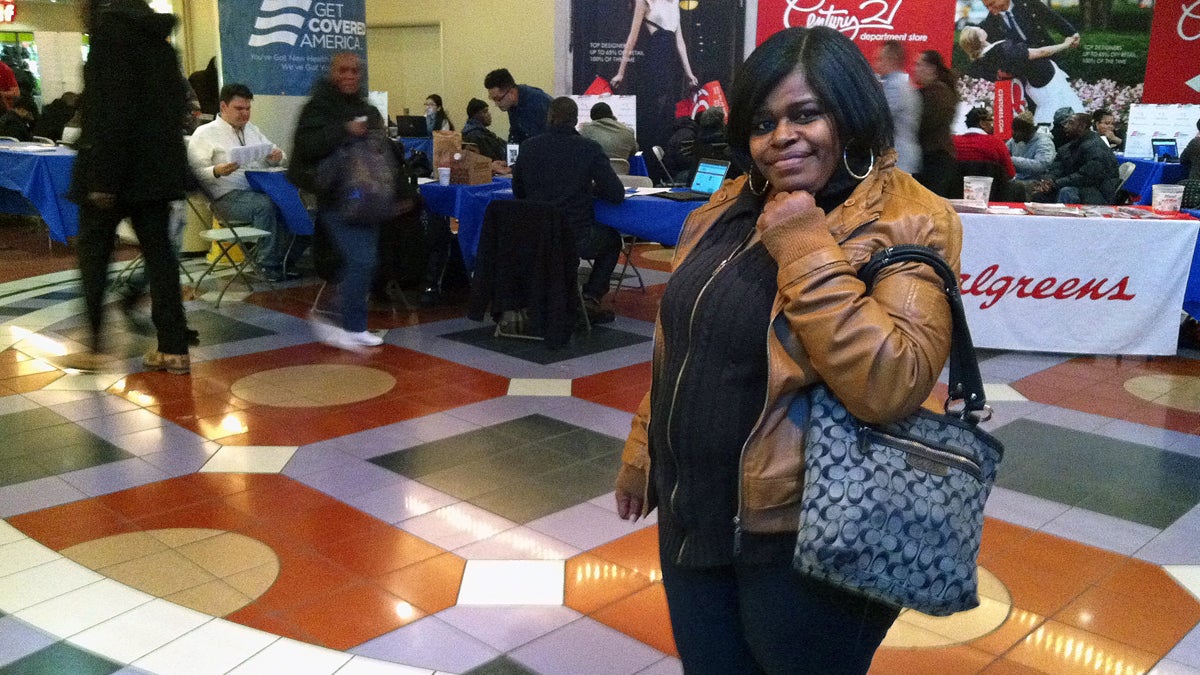  Karen Randall attends an Enroll America insurance sign-up blitz inside the lower level of Jefferson Station on Saturday. (Elana Gordon/WHYY) 