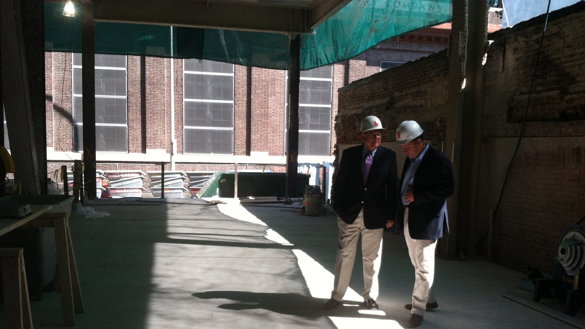  Steve Popper of Clemens Construction consults with Ron Meyers on the site of AQ Rittenhouse, a luxury development that is part of the boom in housing construction in Center City.(Emma Jacobs/WHYY) 