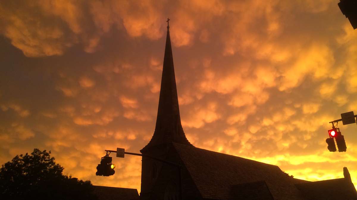  Following destructive storms that some thought might have touched off tornadoes, the sky brightens over Trinity Episcopal Church in Moorestown, New Jersey, Tuesday evening. (Emma Lee/WHYY) 
