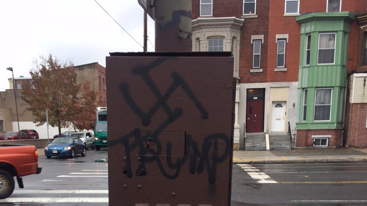 A swastika over Trump's name was painted on an electrical box at South Broad and Reed streets in Philadelphia. (Siobhan Sullivan)