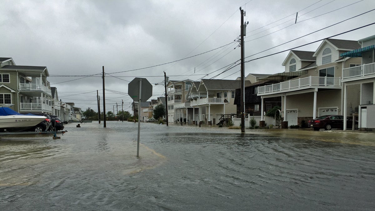 Sea Isle City streets began flooding Friday morning as high tide rolled in. (Joe Hernandez/WHYY) 