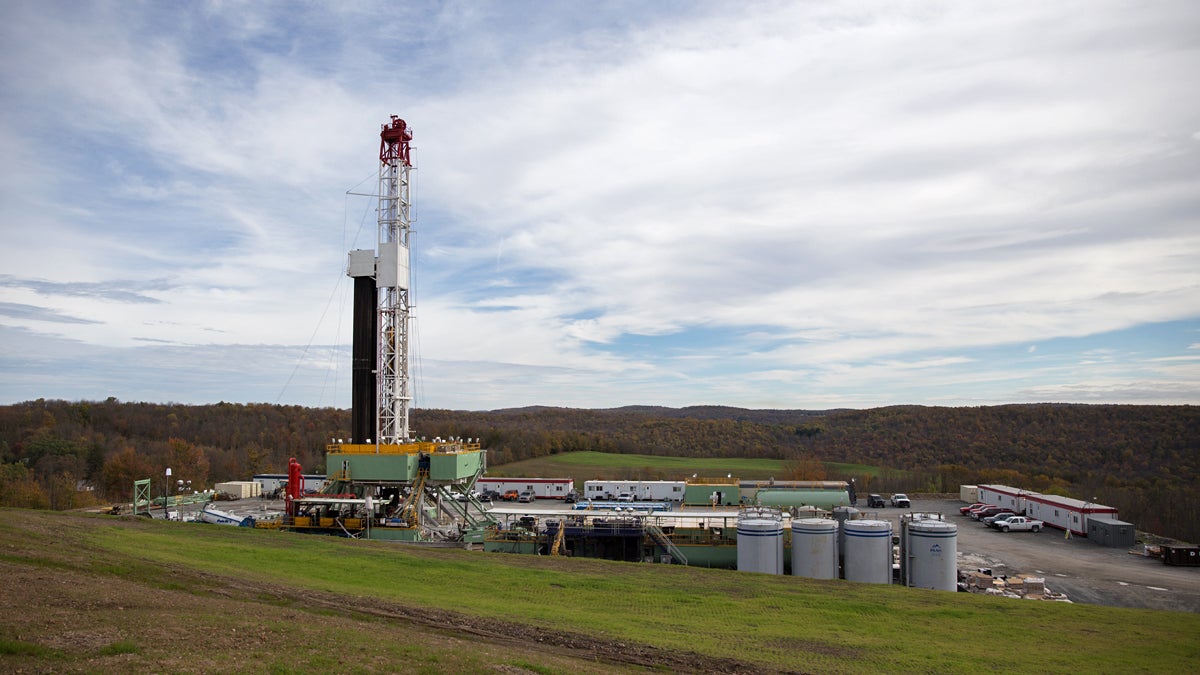 A Cabot Oil & Gas drill rig nestled into the landscape in Kingsley, Pa.  (Lindsay Lazarski/WHYY)   