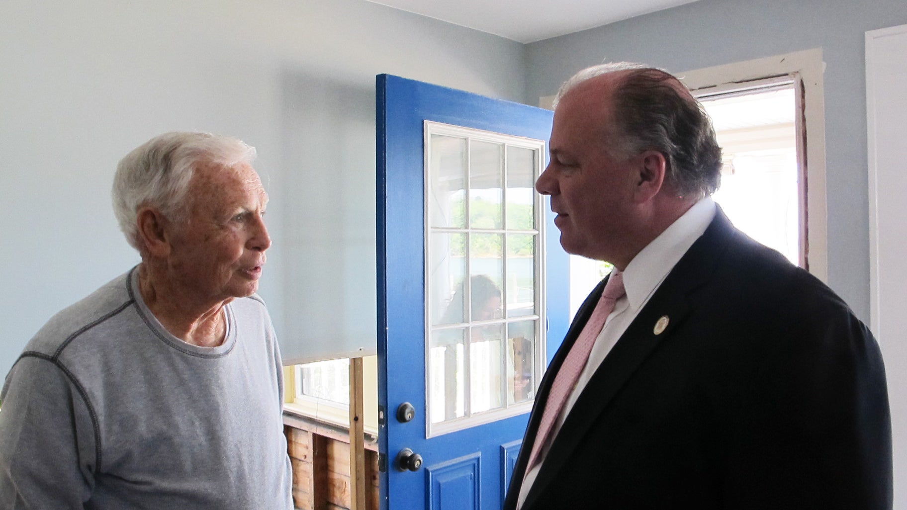  82-year-old Tom Largey and Senate President Steve Sweeney meet in Largey's Sandy-damaged Sea Bright home to urge lawmakers to override Governor Christie's veto of the Sandy Bill of Rights (Phil Gregory/WHYY) 