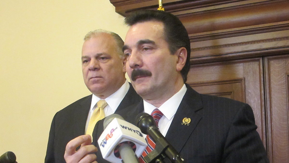  Senate President Steve Sweeney, left, and Assembly Speaker Vinnie Prieto announce an agreement to resolve their differences on increasing New Jersey’s minimum wage. (Phil Gregory/WHYY) 