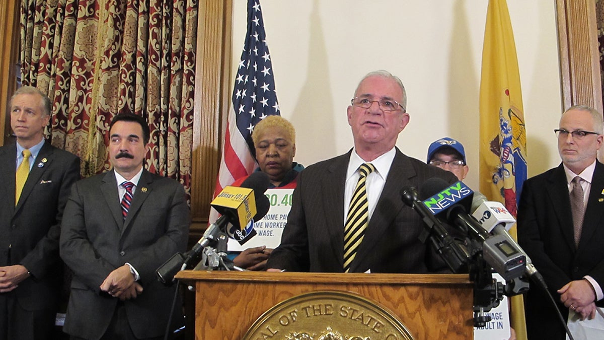  Democratic lawmakers introduce a measure calling for $15 an hour minimum wage in New Jersey. (Phil Gregory/WHYY) 