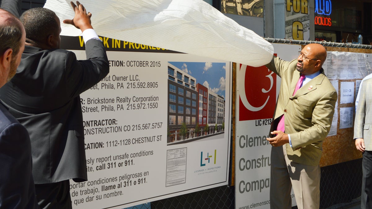  Mayor Michael Nutter and  Licenses and Inspections Commissioner Carlton Williams unveil the sign for big projects (Tom MacDonald/WHYY) 