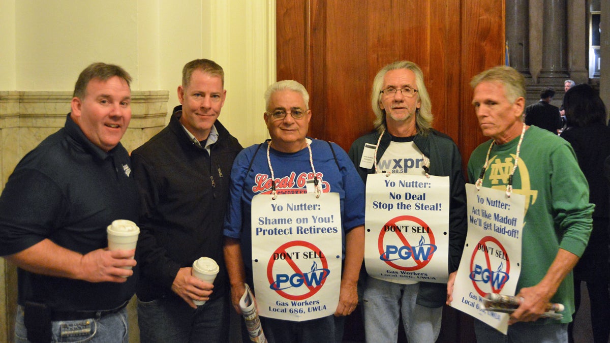  PGW union workers including Business agent Mike Mc Donough (far left) greet council members as they enter caucus room (Tom MacDonald/WHYY) 