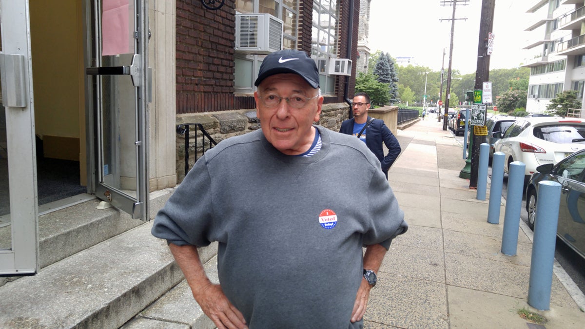  Seth Edelman poses for a photo outside a polling place in the Art Museum area. (Tom MacDonald/WHYY) 