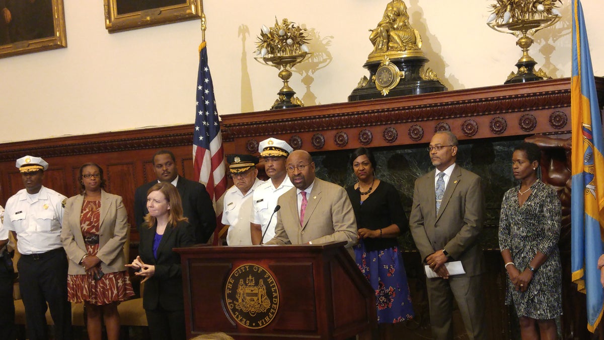  Surrounded by city officials, Mayor Nutter called the pope's visit historic and urged residents to get excited. (Tom MacDonald/WHYY) 